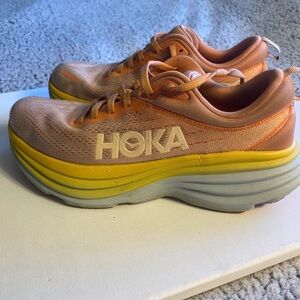 Hoka Bondi 8 Women’s Peach and Yellow Cushioning Running Shoes